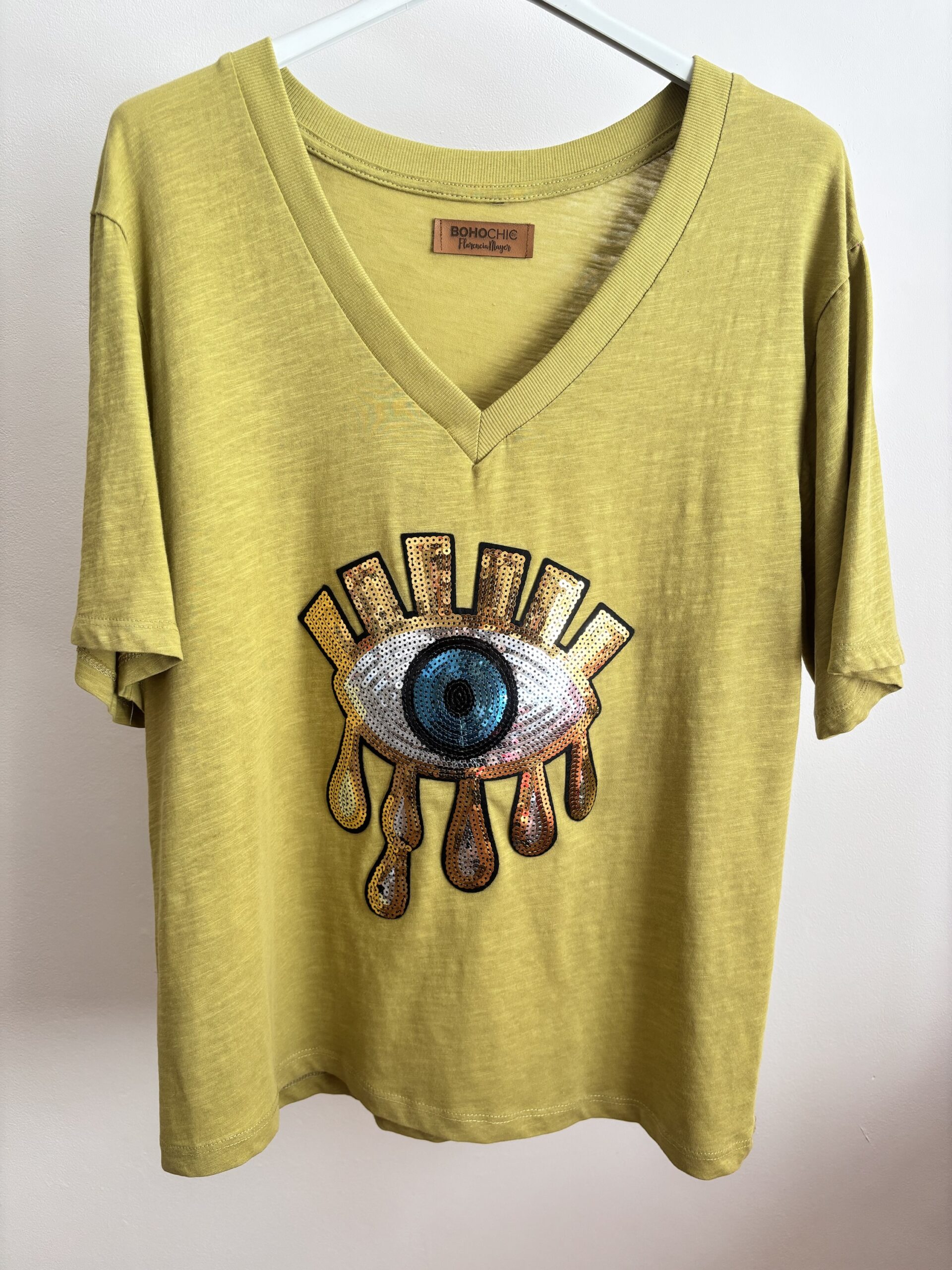 Verde con ojo dorado 🌟